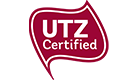 Der UTZ Certified Schriftzug auf einer roten Fahne mit weißer Umrandung.